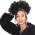 femme souriant portant un postiche curly cheveux péruviens